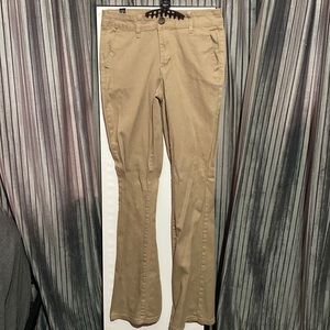 Khaki bell bottoms.